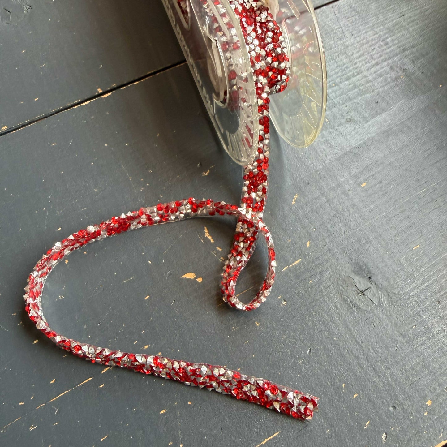 Thermo sierband steentjes rood/zilver