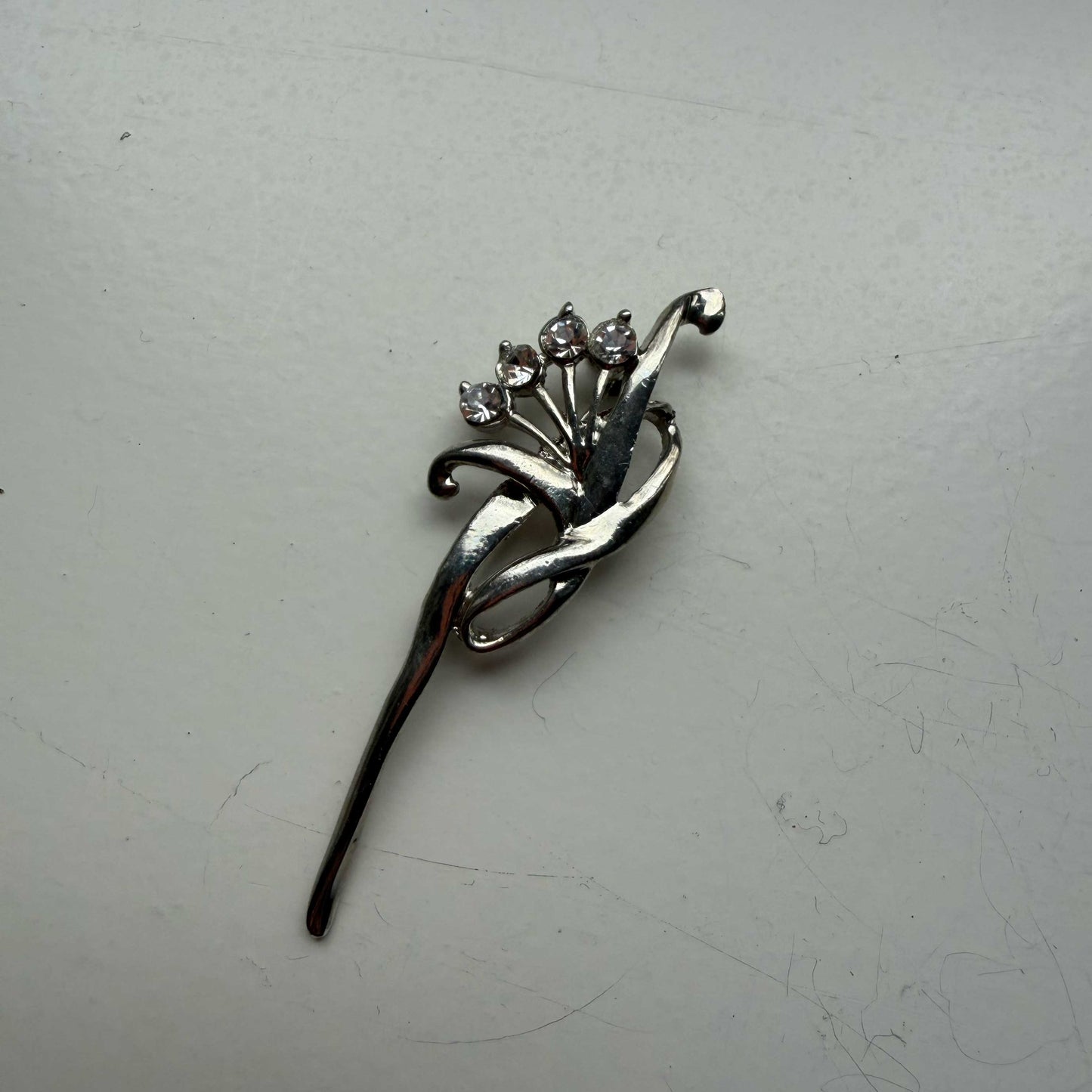 Vintage broche zilver met strass-steentjes