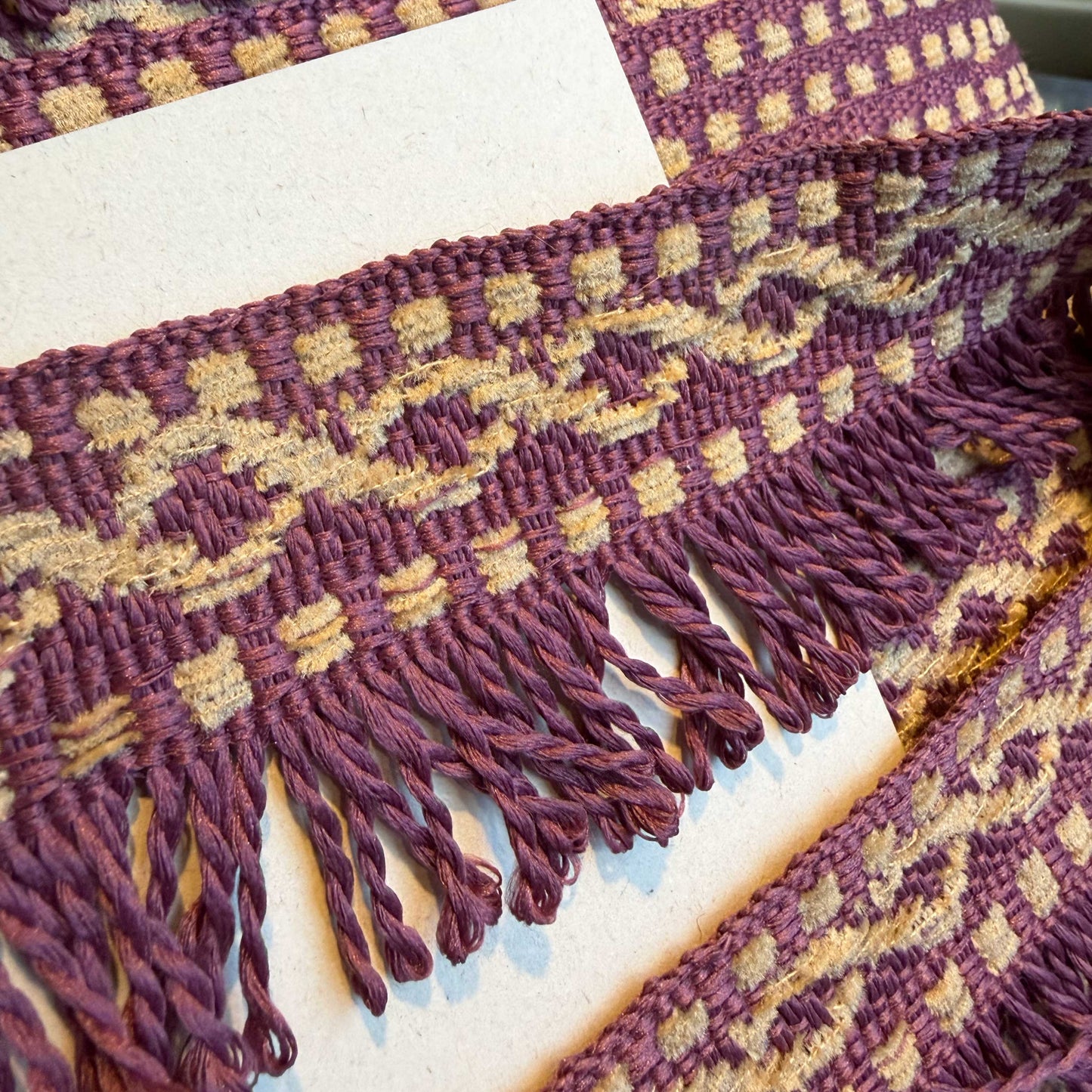 Franje sierband in paars met crème kleuren