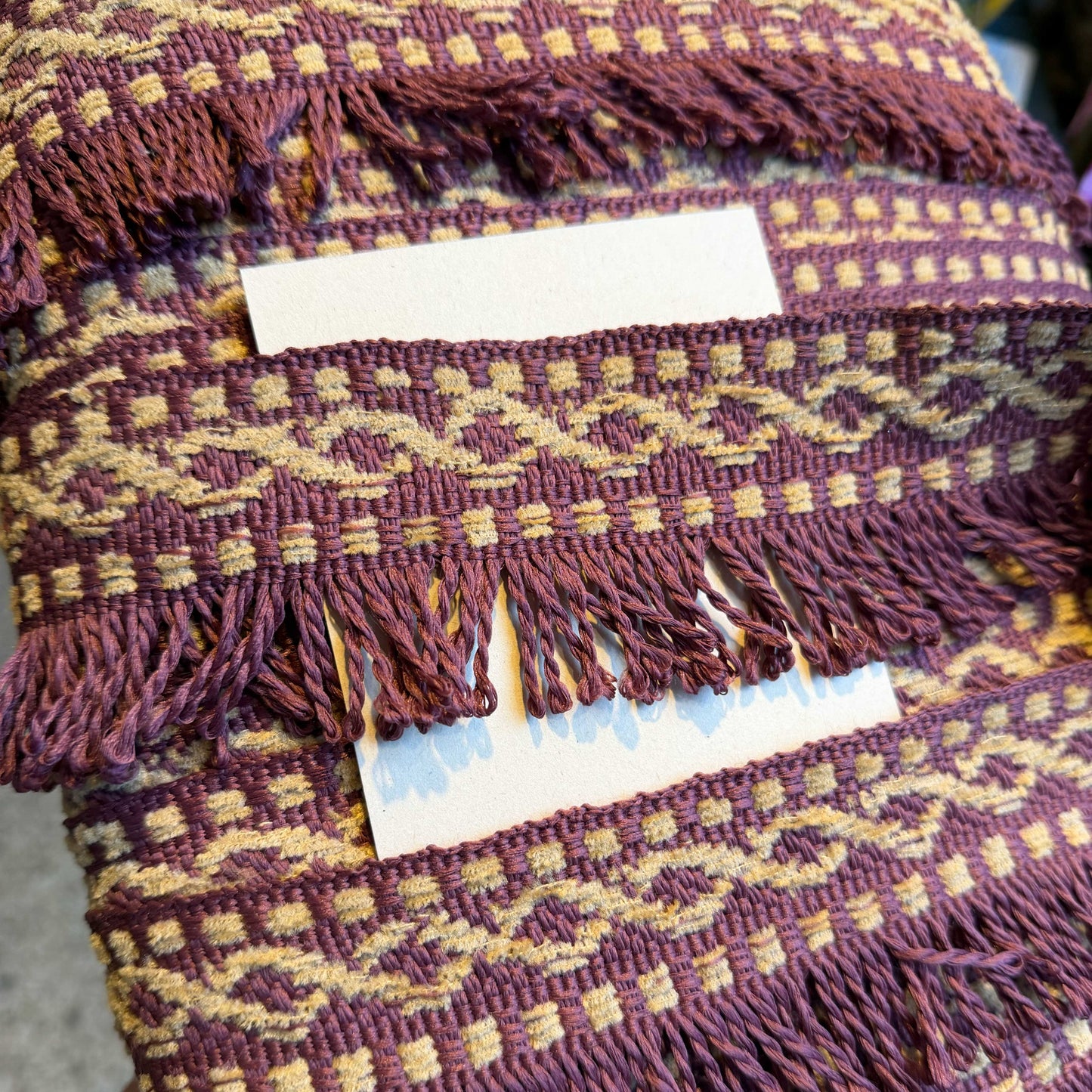 Franje sierband in paars met crème kleuren