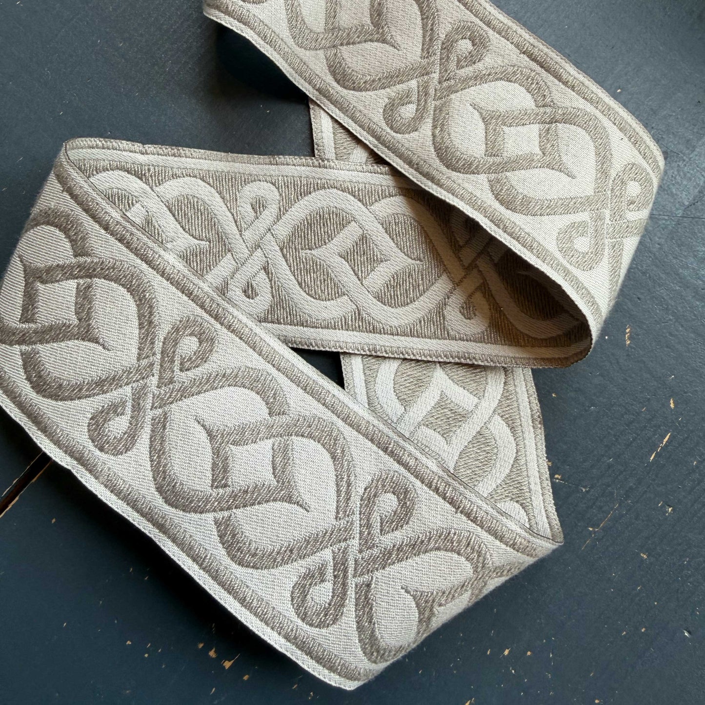 Jacquard band met ornamentmotief beige