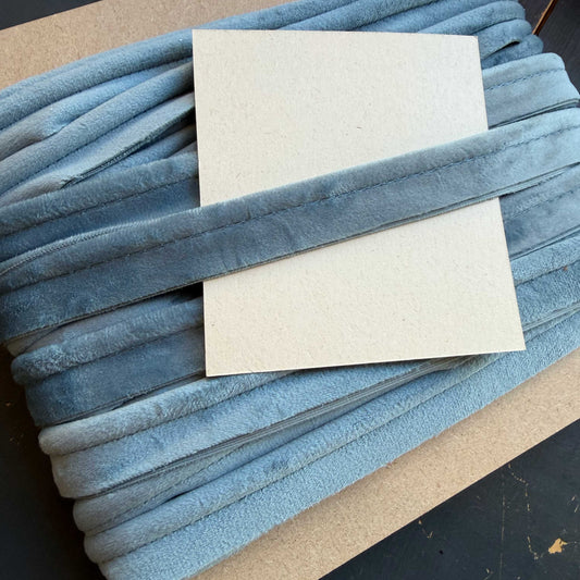 Fluwelen paspelband blauw