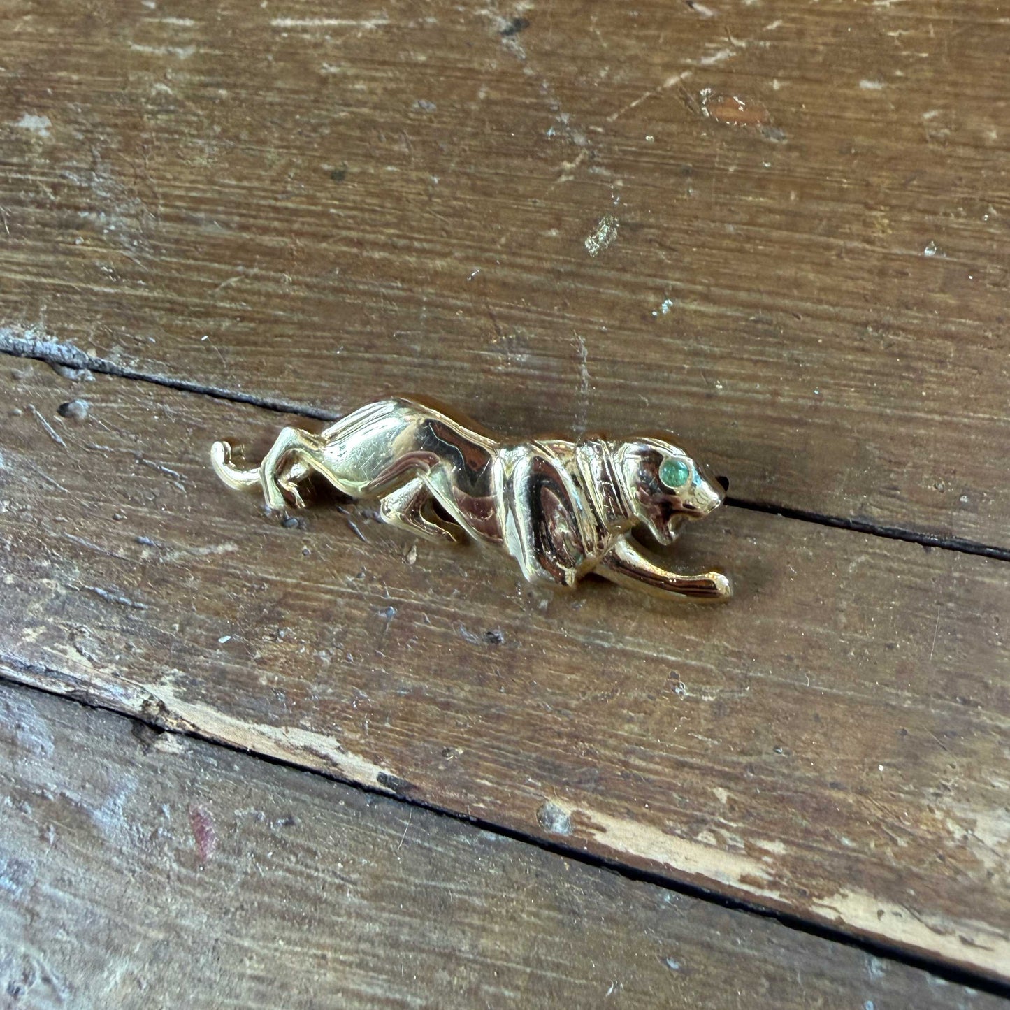 Vintage broche goud – panter met groen oog
